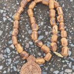 Original Tulsi Jagannath Locket with Pendant Mala Material Tulsi Mala Length 20 Inches Deity Name Shri Jaganathji Bead Shape Cylindrical