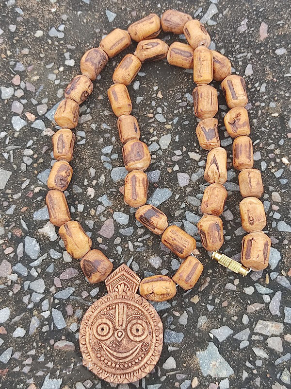 29 Original Tulsi Jagannath Locket with Pendant Mala Material Tulsi Mala Length 20 Inches Deity Name Shri Jaganathji Bead Shape Cylindrical