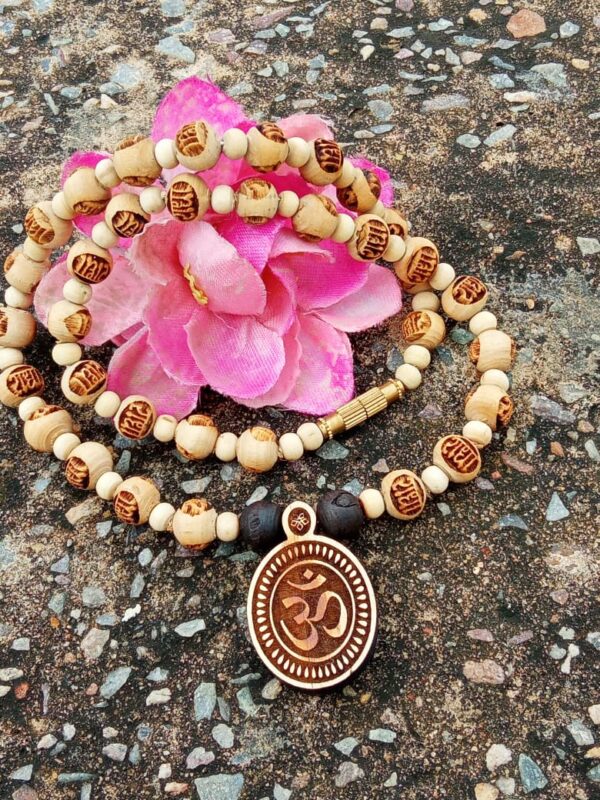 65-600x800 Om Locket Mala With Radha Naam Rosary Beads Material Tulsi Mala Length 20 Inches Neck Round 1 Round Deity Name Shri Radha Carving Name Om, Radha Bead Shape Spherical