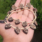 Hare Krishna Beautiful Japa Mantra Tulsi Necklace Premium Disclaimer : Product’s color may slightly vary due to photographic lighting sources or your monitor settings. Precaution : This Tulsi bead is brittle, handle with care Instruction : If you put Tulsi Beads in water the color may change. Note : Descriptions for products are taken from scriptures and oral tradition